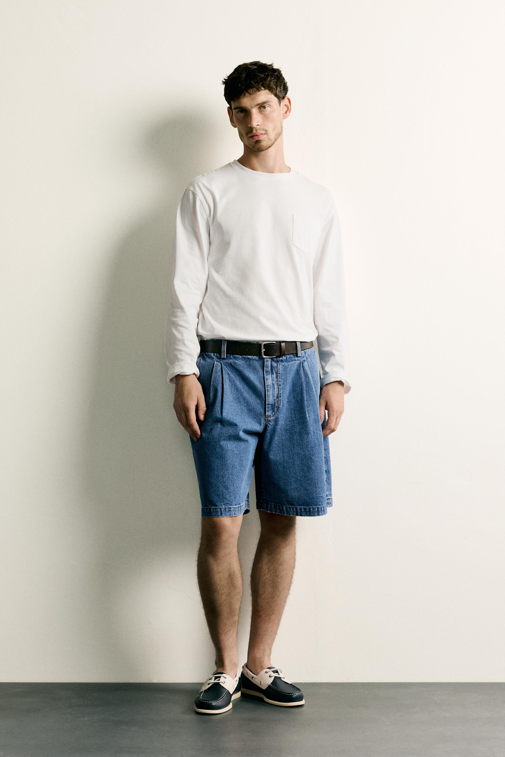 REGULAR FIT PLEATED DENIM SHORTS